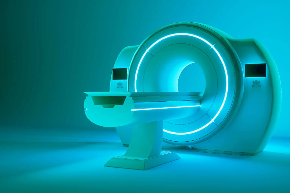 MRI machine lit with blue lights